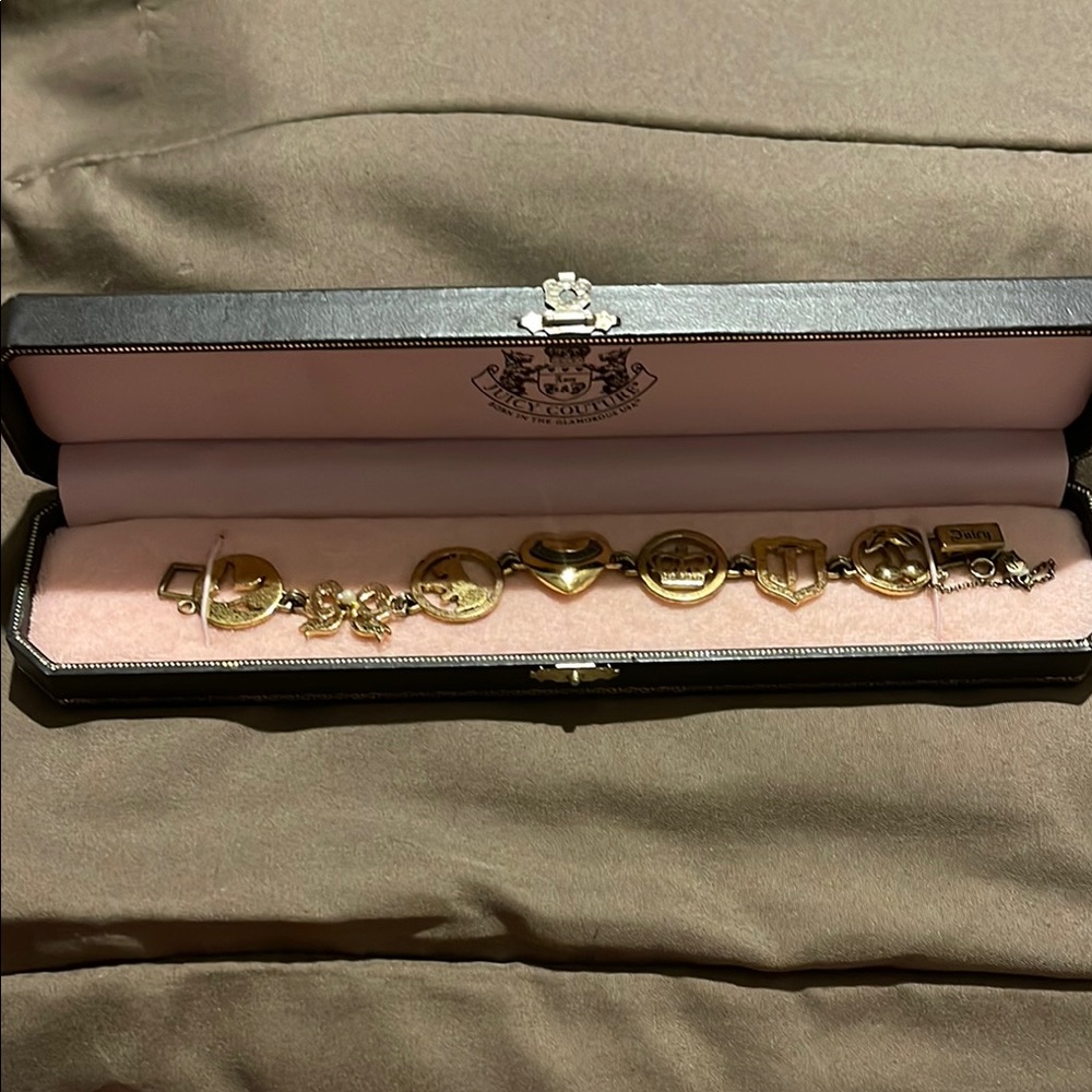 Juicy Couture Gold Charm Bracelet with Heart and Shield